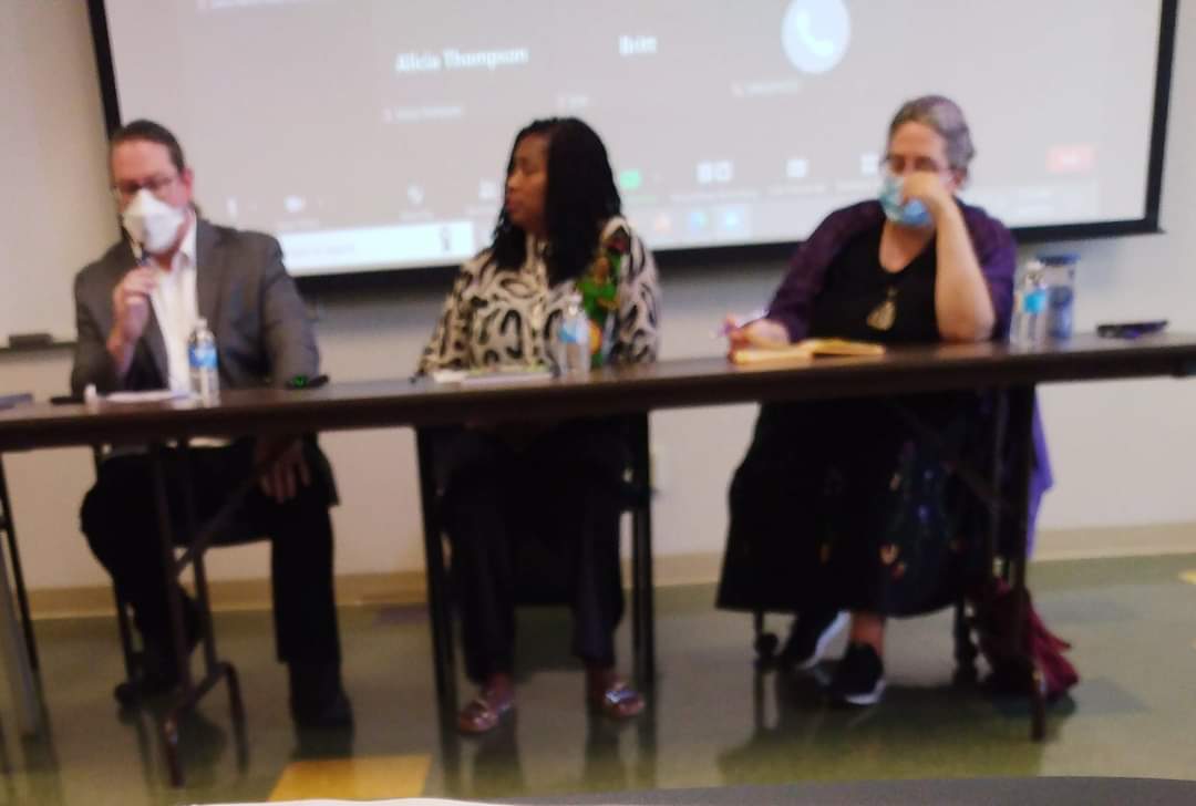 Blurred Image Of 3 Individuals